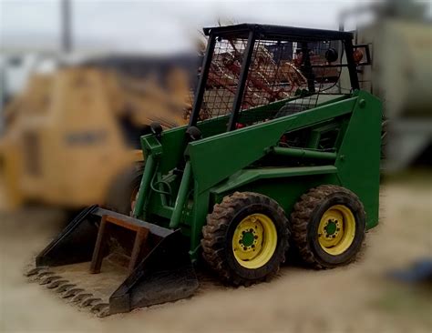 john deere 125 skid steer attachments|john deere 125 spark plug.